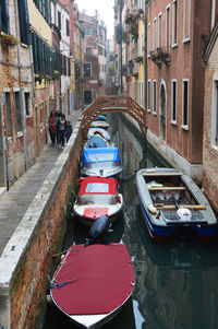 Boats moored in city