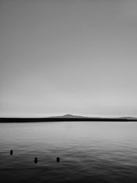 Scenic view of lake against clear sky