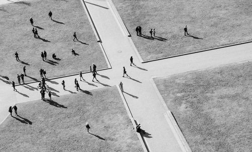 High angle view of people on snowy field