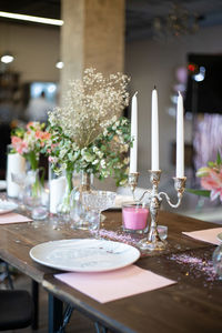 Flower pot on table at restaurant