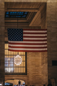 Low angle view of flags on building