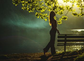 Woman at beach during sunset