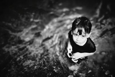 Close up of boy in grass