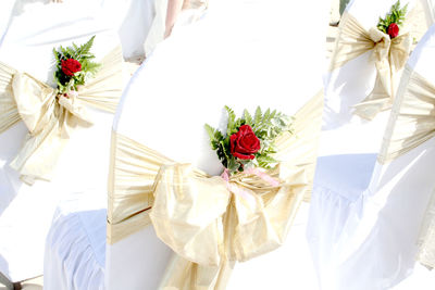 Close-up of flower bouquet against white wall