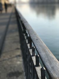 Close-up of railing on pier