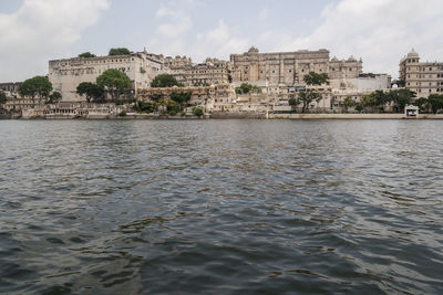 View of river with buildings in background