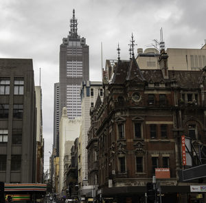 Buildings in city against sky