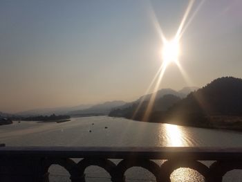 Scenic view of mountains against clear sky during sunset