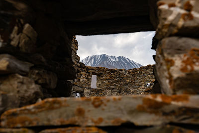 Rocks in mountains against sky