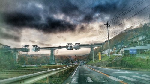 Cloudy sky over road