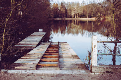 Scenic view of lake by trees in forest