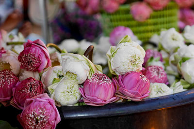 Close-up of pink roses for sale at market stall
