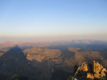 Scenic view of mountains against sky during sunset