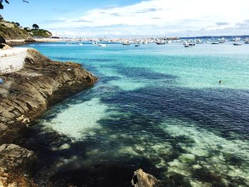 Scenic view of sea against blue sky