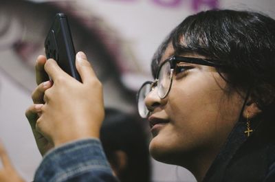 A cute girl smiling while reading the text