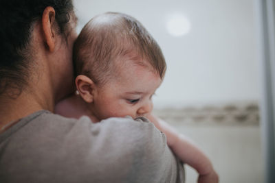 Portrait of mother with baby