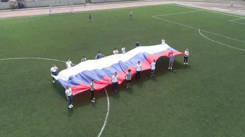 High angle view of people playing on field