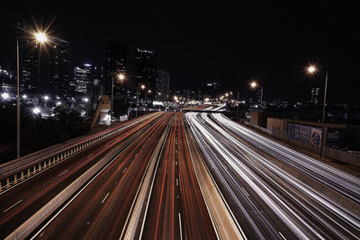 High angle view of light trails on street at night