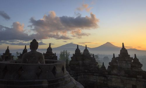 Panoramic view of temple against sky during sunset