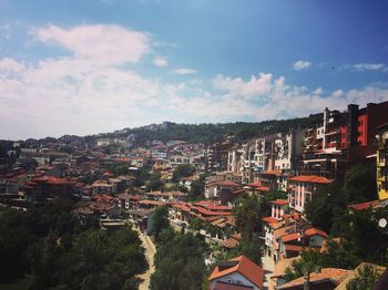 High angle shot of townscape against sky