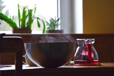 Close-up of cup on table