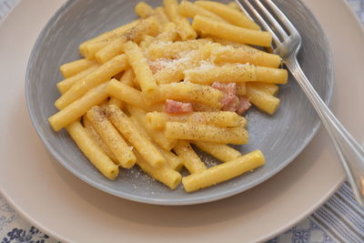 High angle view of pasta in plate on table