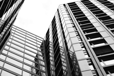 Low angle view of modern buildings against clear sky