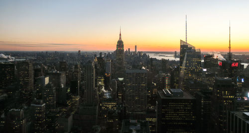 Aerial view of city at sunset