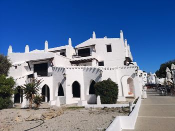 Exterior of historic building against clear blue sky