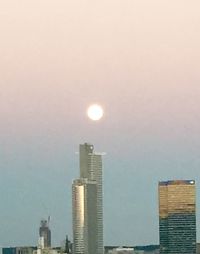 Low angle view of cityscape against sky