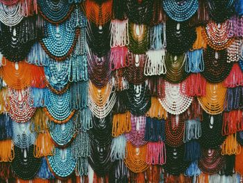Full frame shot of multi colored jewelry for sale in market