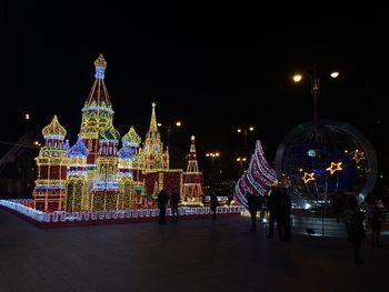 Illuminated christmas tree at night