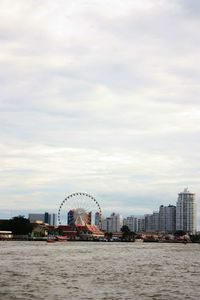 View of ferris wheel in city