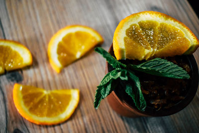 Close-up of oranges on table