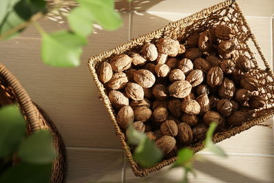 High angle view of vegetables in basket on table