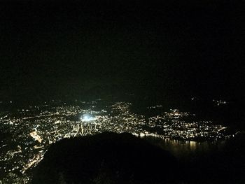 Illuminated cityscape at night