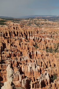 Aerial view of rock formations against sky