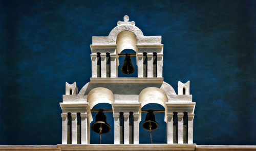 Low angle view of historical building against blue sky