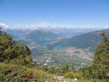 High angle view of plants and mountains against sky