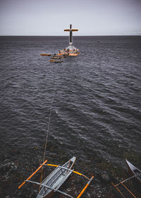 High angle view of nautical vessel on sea against sky
