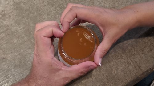 Close-up of hand holding ice cream