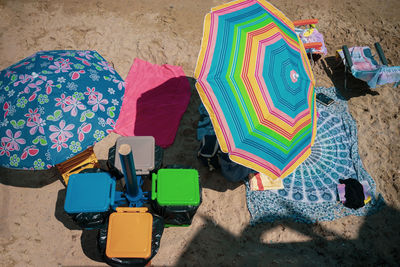 High angle view of toys on sand