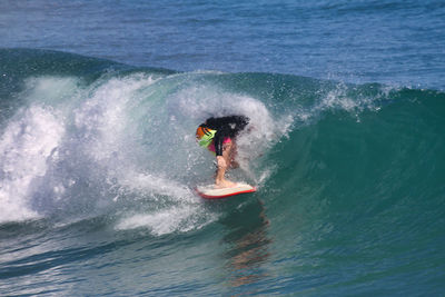 Man surfing in sea