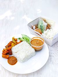 High angle view of food served on table