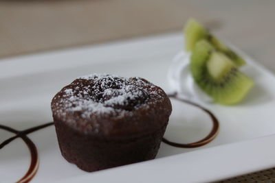 Close-up of cake served in plate on table