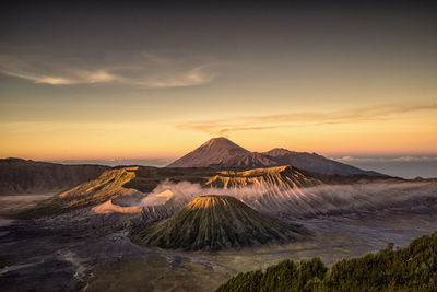 Scenic view of landscape at sunset