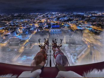 High angle view of illuminated cityscape