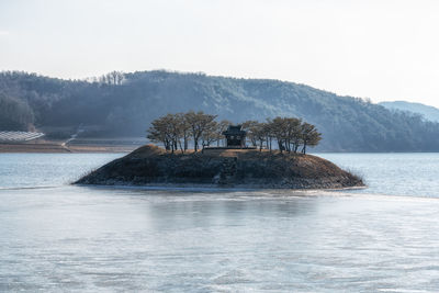 A small shrine built on an island in ansan lake in front of dosan seowon in andong, south korea