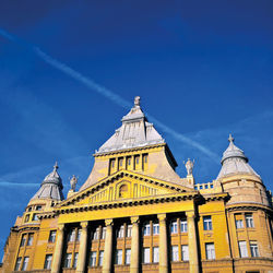 Low angle view of temple against blue sky