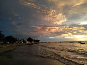 Scenic view of sea against sky at sunset